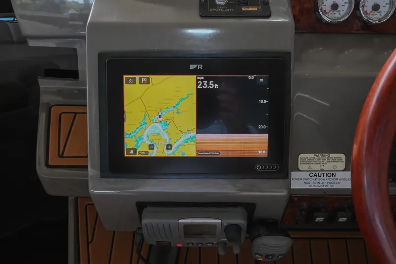 Slide: The Image of Dashboard of a 2009 Regal 3060 Window Express with navigation display. - 20