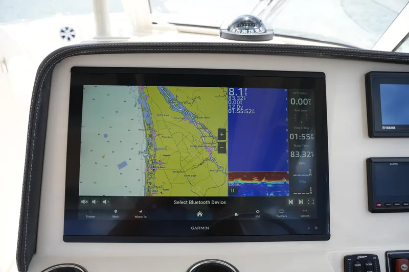 Slide: The Image of Garmin navigation display on 2018 Grady-White Freedom 325 boat dashboard. - 35