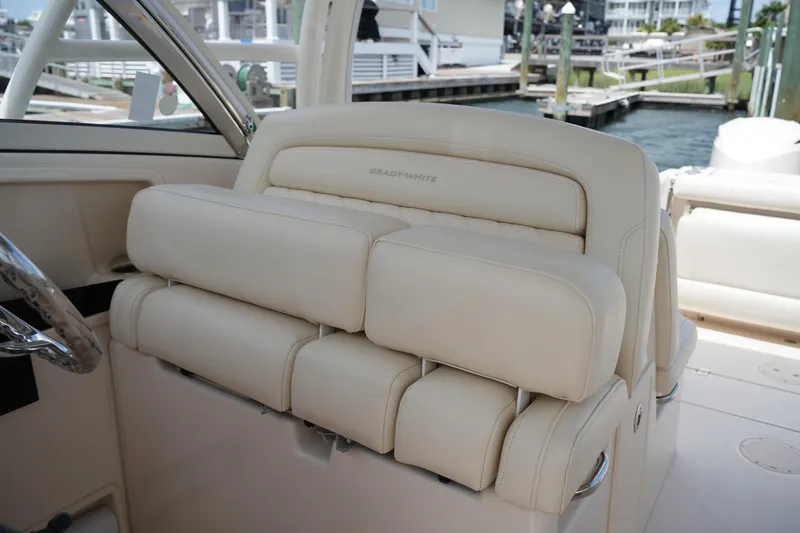 Slide: The Image of Luxurious seating on a 2018 Grady-White Freedom 325 boat, dockside view. - 30