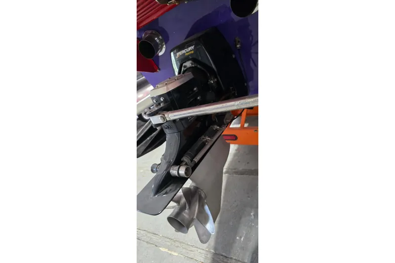 Slide: The Image of 2003 Cigarette 38' Top Gun boat engine detail with Mercury components. - 28