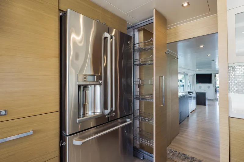 Slide: The Image of Luxurious kitchen interior of 2016 Hargrave Flybridge Motor Yacht with stainless steel appliances. - 13