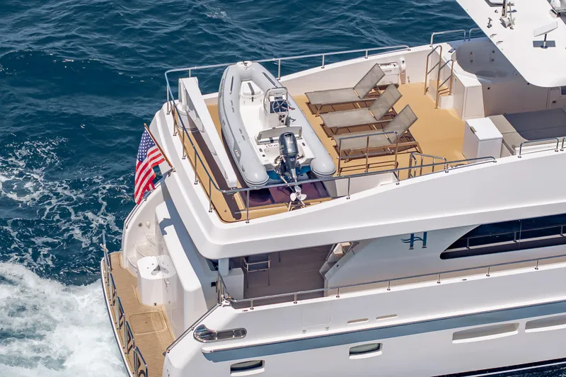 Slide: The Image of 2016 Hargrave Flybridge Motor Yacht with sun loungers and tender on deck. - 94