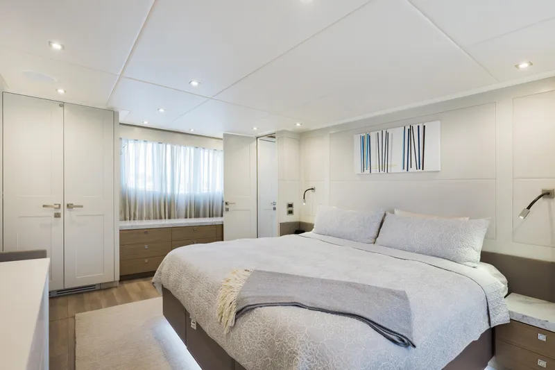 Slide: The Image of Luxurious bedroom interior of 2016 Hargrave Flybridge Motor Yacht with modern decor and cozy bedding. - 41