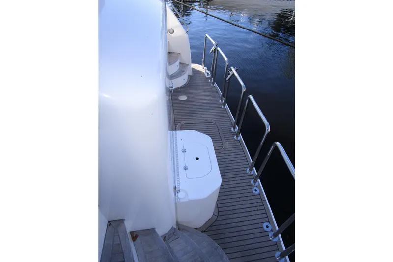 Slide: The Image of 2016 Hargrave Flybridge Motor Yacht deck with sleek design and stainless steel railings. - 73