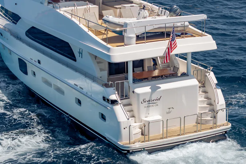 Slide: The Image of 2016 Hargrave Flybridge Motor Yacht cruising on open water, featuring elegant design and spacious deck. - 89