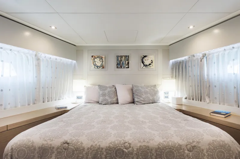 Slide: The Image of Luxurious bedroom interior of 2016 Hargrave Flybridge Motor Yacht with elegant decor and soft lighting. - 26