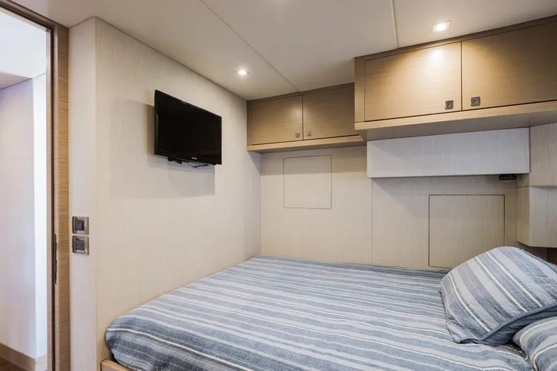Slide: The Image of Interior cabin of 2016 Hargrave Flybridge Motor Yacht with bed and wall-mounted TV. - 78