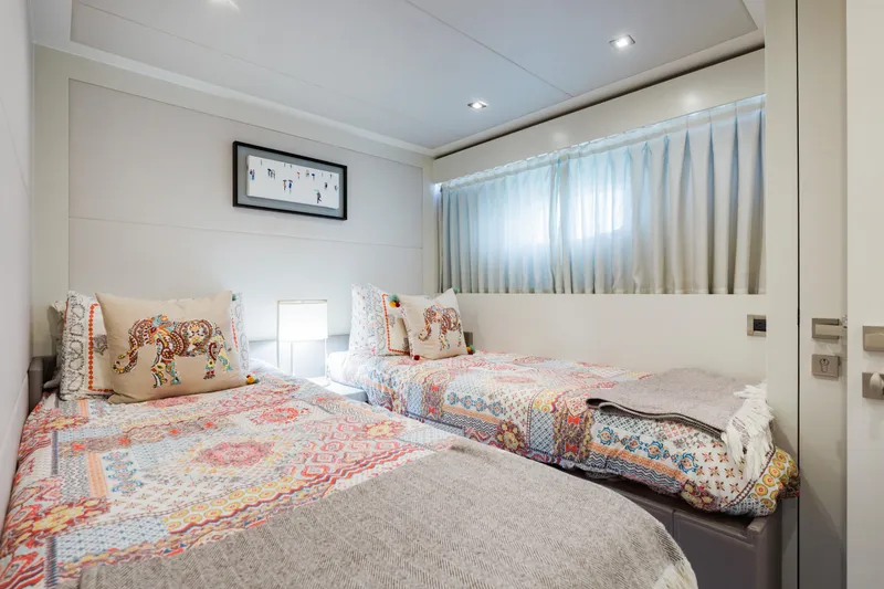Slide: The Image of Luxurious twin bedroom on 2016 Hargrave Flybridge Motor Yacht with elegant decor and soft lighting. - 36