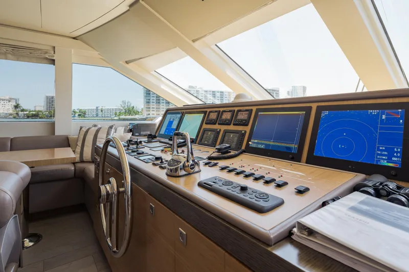 Slide: The Image of Luxurious 2016 Hargrave Flybridge Motor Yacht helm with advanced navigation systems and plush seating. - 15