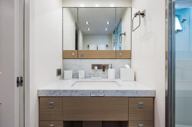 Slide: The Image of Luxurious bathroom on 2016 Hargrave Flybridge Motor Yacht with marble countertop and modern fixtures. - 37