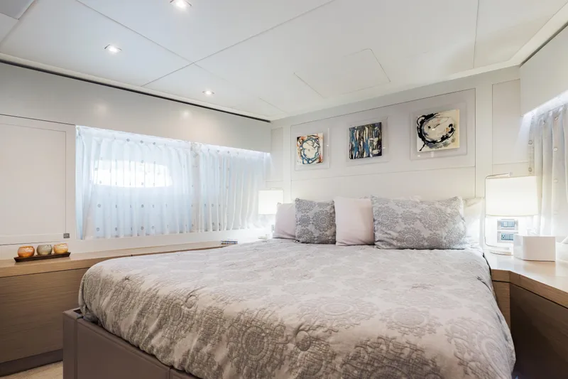 Slide: The Image of Luxurious bedroom interior of 2016 Hargrave Flybridge Motor Yacht with elegant decor and soft lighting. - 25