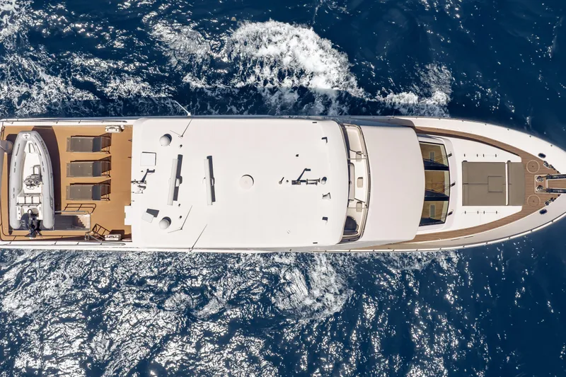 Slide: The Image of Overhead view of 2016 Hargrave Flybridge Motor Yacht cruising on blue ocean waters. - 92