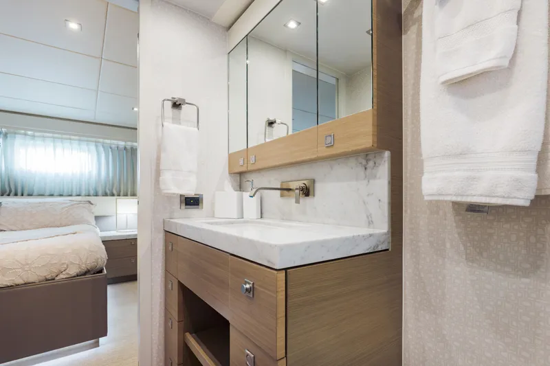 Slide: The Image of Luxurious bathroom in 2016 Hargrave Flybridge Motor Yacht with marble countertop and modern fixtures. - 35