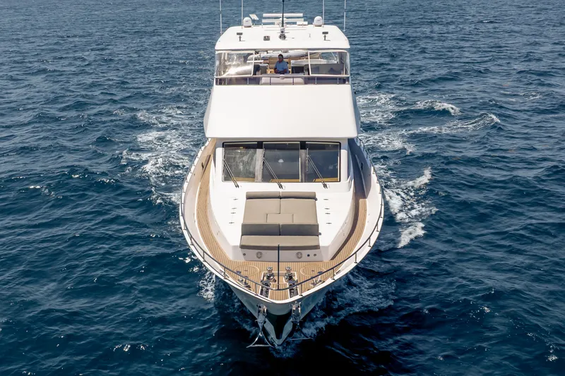 Slide: The Image of 2016 Hargrave Flybridge Motor Yacht cruising on open sea, aerial front view. - 91