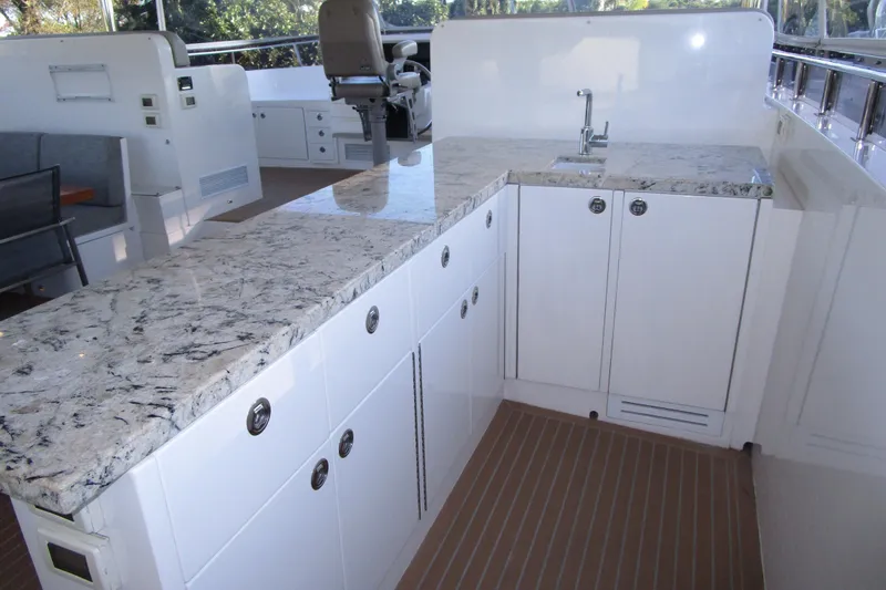 Slide: The Image of Luxurious 2016 Hargrave Flybridge Motor Yacht with elegant granite countertop and modern amenities. - 59