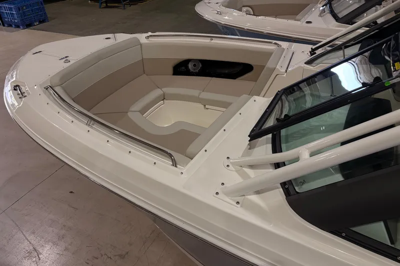 Slide: The Image of 2026 Boston Whaler 240 Vantage boat interior with spacious seating and sleek design. - 5