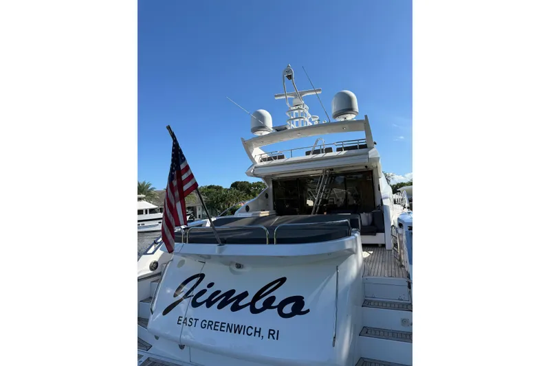 Slide: The Image of Sunseeker Predator Sport Yacht 74, 2012, docked with American flag, East Greenwich, RI. - 33