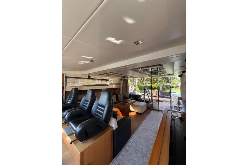 Slide: The Image of Interior of 2012 Sunseeker Predator Sport Yacht 74 with luxurious seating and modern design. - 16