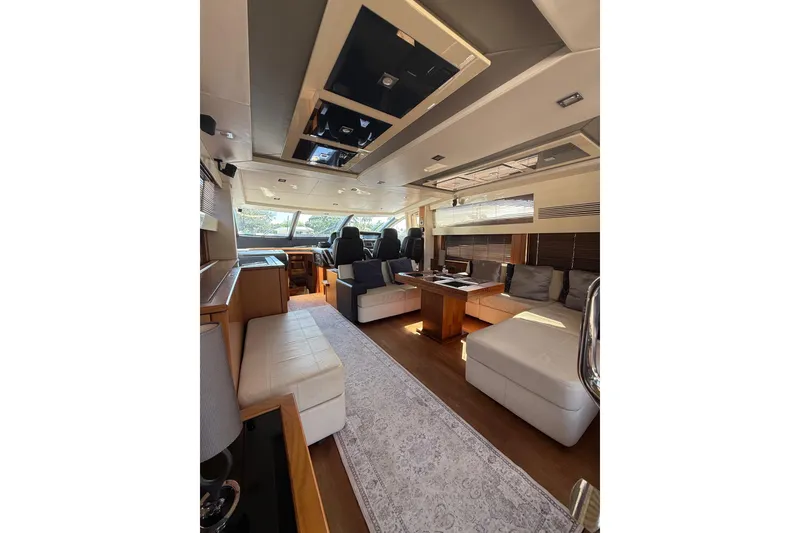Slide: The Image of Luxurious interior of 2012 Sunseeker Predator Sport Yacht 74 with elegant seating and modern design. - 14