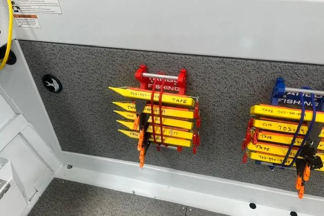 Slide: The Image of Storage area with fishing gear on a 2020 Hewescraft 240 Ocean Pro boat. - 7