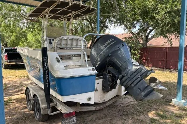 Slide: The Image of 2017 Robalo R200 Center Console boat with Yamaha outboard motor on trailer. - 2