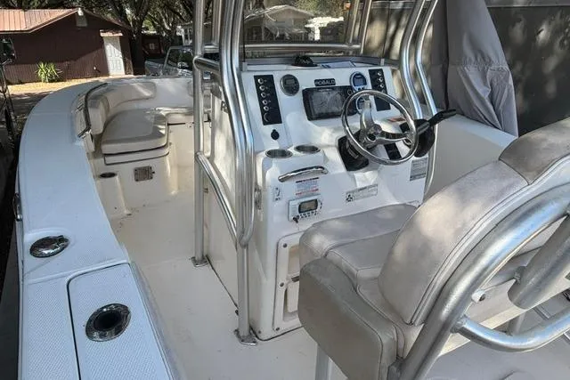 Slide: The Image of 2017 Robalo R200 Center Console boat interior with steering wheel and seating. - 10