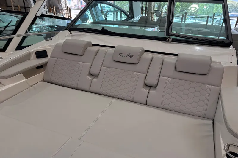 Slide: The Image of Luxurious seating on 2027 Sea Ray Sundancer 320 yacht, featuring elegant upholstery and modern design. - 18