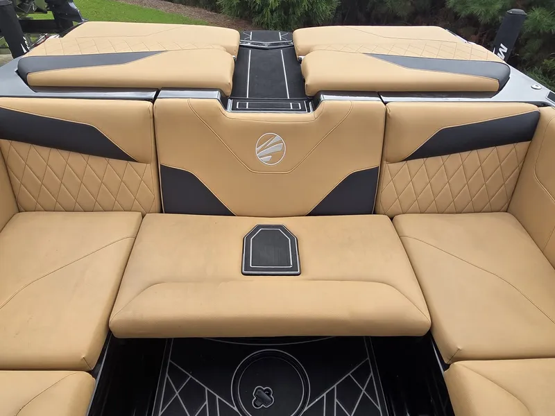 Slide: The Image of The image shows the luxurious interior of a Tigé Z3 boat with beige upholstery. - 15