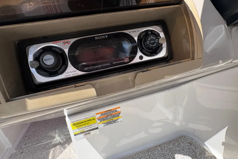 Slide: The Image of Sony stereo system on a 2005 Crownline 220 EX boat dashboard. - 14