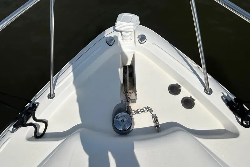Slide: The Image of Bow of 2001 Wellcraft 3700 Martinique boat with anchor chain and railing. - 7