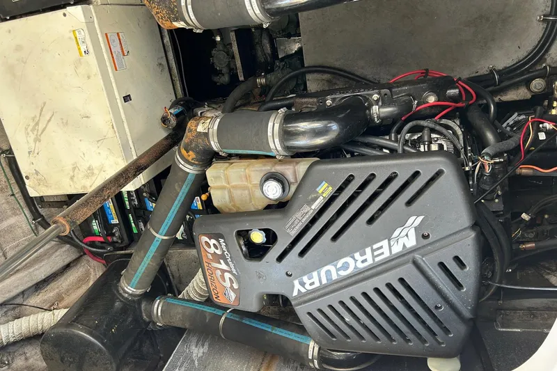 Slide: The Image of Engine compartment of a 2001 Wellcraft 3700 Martinique with Mercury 8.1S motor. - 31