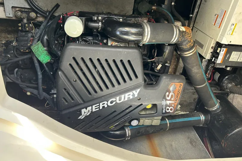 Slide: The Image of Engine compartment of a 2001 Wellcraft 3700 Martinique with Mercury 8.1S Horizon engine. - 32