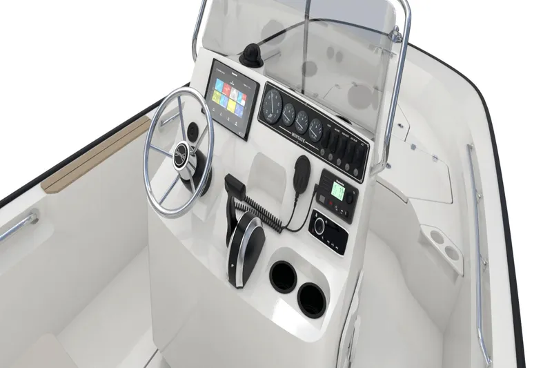 Slide: The Image of The image shows the helm of a Boston Whaler 190 Montauk with modern instruments and controls. - 25