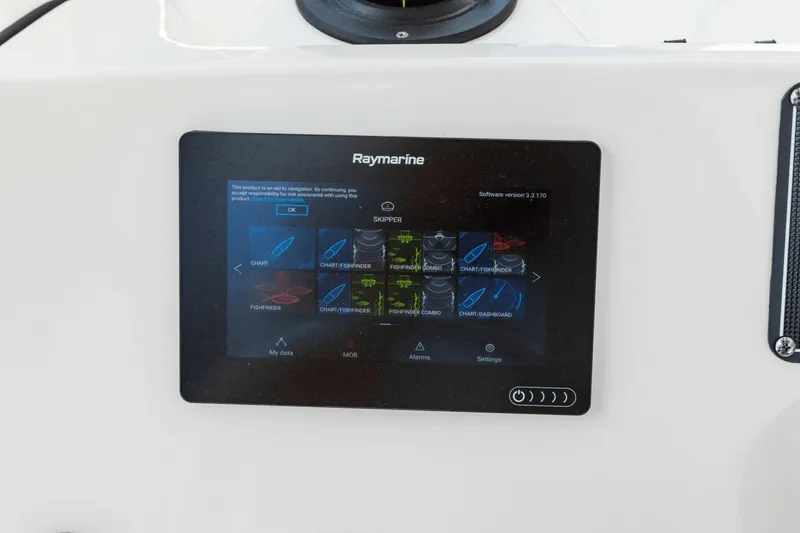 Slide: The Image of A Raymarine screen on a boat displaying various navigation and control options. - 26