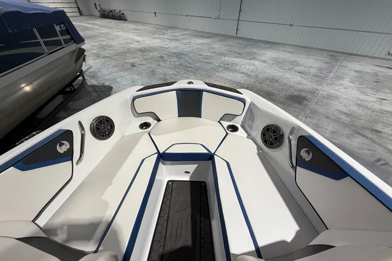Slide: The Image of Interior view of 2022 Scarab 195 ID boat, featuring sleek seating and modern design. - 5