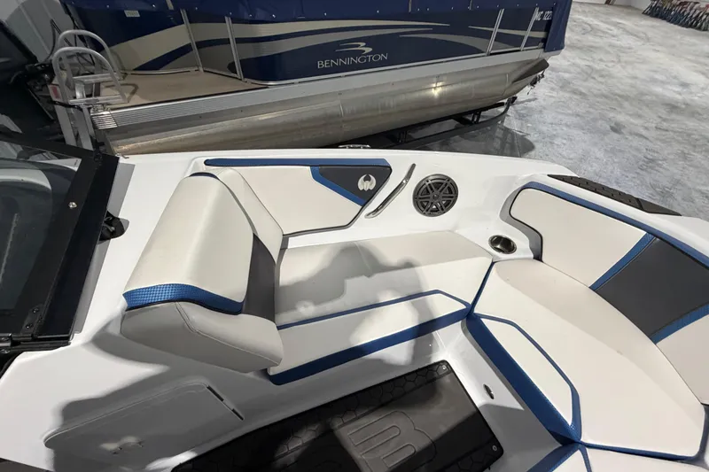 Slide: The Image of Interior of 2022 Scarab 195 ID boat with stylish seating and speaker system. - 7