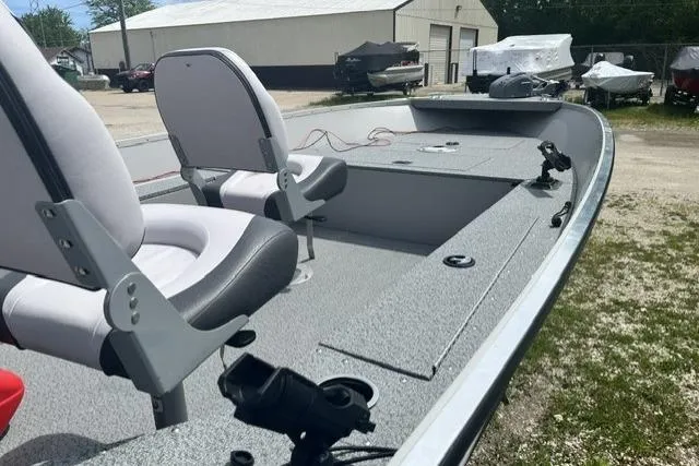 Slide: The Image of 2022 Smoker Craft Angler 14 T boat with dual seats and fishing rod holders. - 4