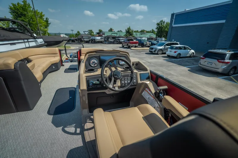 Slide: The Image of Interior view of 2026 Evotti 525QL boat with modern dashboard and seating. - 24