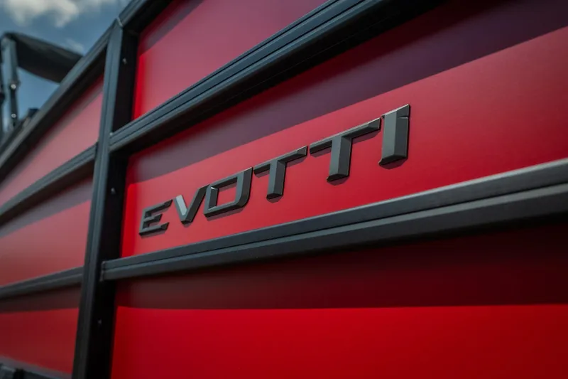 Slide: The Image of Red Evotti 525QL vehicle close-up, showcasing sleek design and branding, 2026 model. - 15