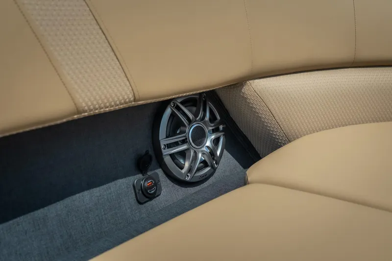 Slide: The Image of Beige interior of 2026 Evotti 525QL featuring a sleek speaker system. - 14