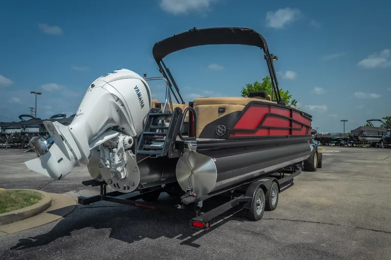 Slide: The Image of 2026 Evotti 525QL pontoon boat with Yamaha outboard motor on trailer. - 5