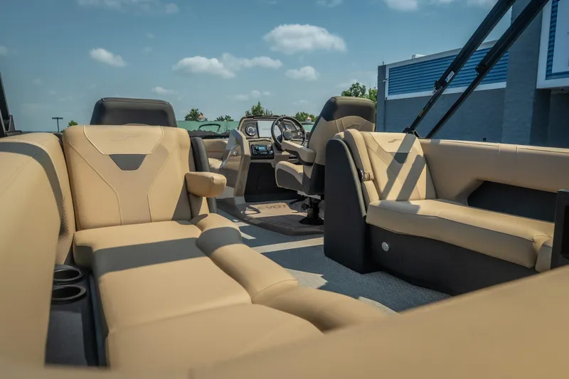 Slide: The Image of Luxurious interior of 2026 Evotti 525QL boat with beige seating and modern dashboard. - 36