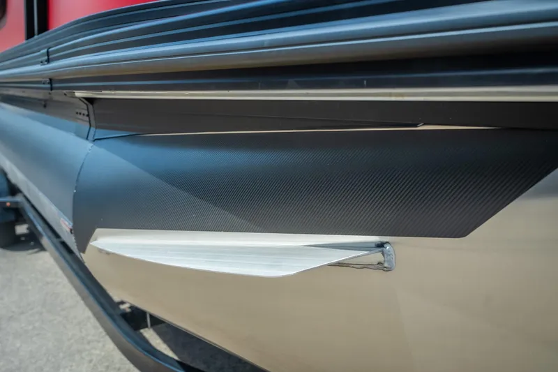 Slide: The Image of Close-up of 2026 Evotti 525QL boat hull with sleek design and modern detailing. - 7