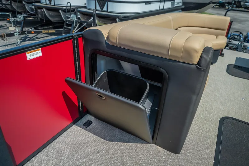 Slide: The Image of Evotti 525QL 2026 boat interior with storage compartment and beige seating. - 38