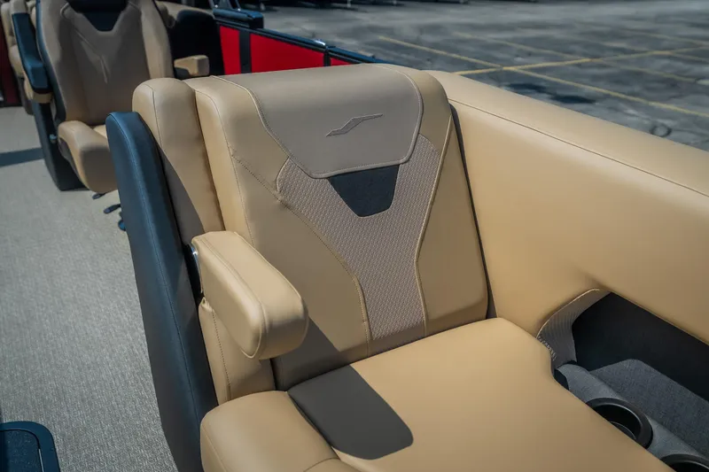 Slide: The Image of Luxurious beige seating in 2026 Evotti 525QL boat, featuring armrests and cup holders. - 18