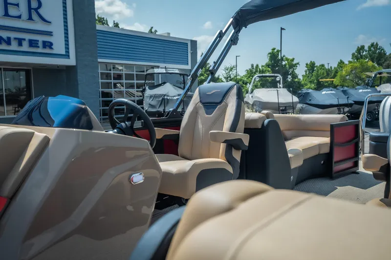 Slide: The Image of 2026 Evotti 525QL boat interior with luxurious seating and modern design at a dealership. - 21
