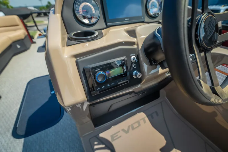Slide: The Image of Evotti 525QL 2026 boat dashboard with steering wheel and control panel. - 28