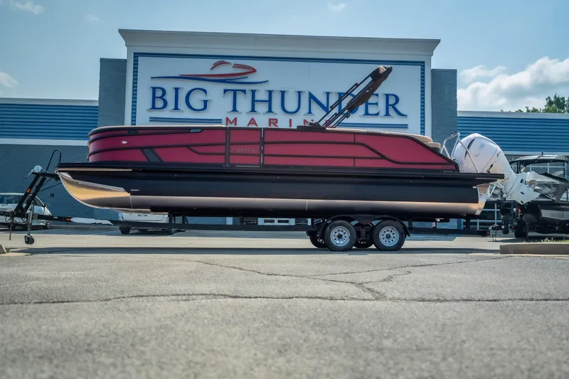 The Image of 2026 Evotti 525QL boat on trailer at Big Thunder Marine dealership. - 0