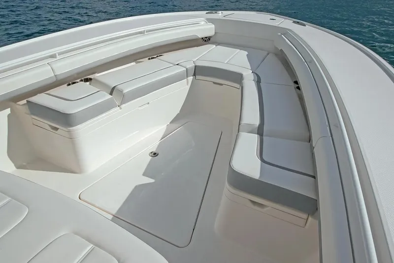 Slide: The Image of Manufacturer Provided Image: 2026 Regulator 28 boat interior with spacious seating and sleek design on the water. - 4