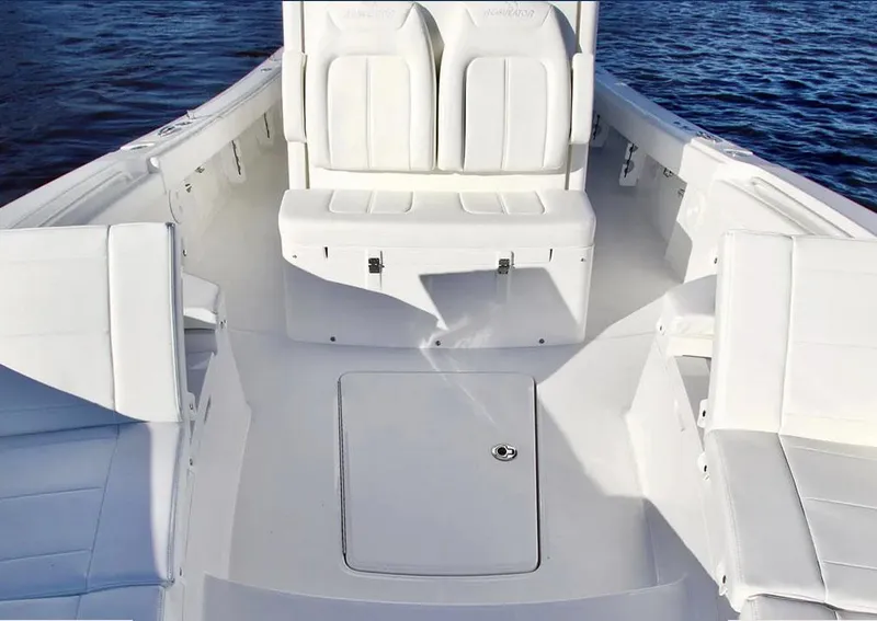 Slide: The Image of Manufacturer Provided Image: Interior of 2026 Regulator 26XO with white seating. - 6